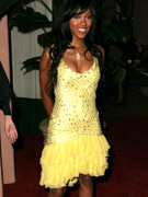 Busty black goddess meagan good in a cool yellow dress