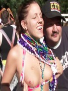 Lusty college sluts with tasty tits partying naked at the beach.