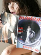 Teen blonde model girl taking nude and erotic window shot for magazine