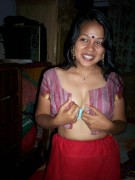 Ponytailed indian cutie taking off her bra before sex
