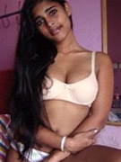 Hot amateur pics of stunning indian cutie in white undies posing.