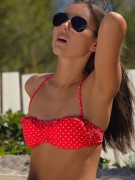 Slutty czech teen in red polka-dot bikini gives head in the garden