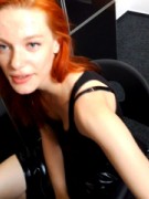 Cute ginger babe in a black dress gets fucked hard at the interview